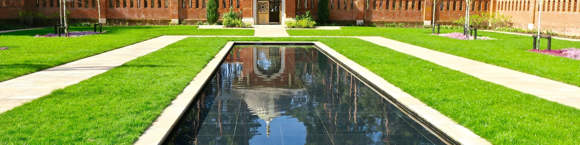 Muslim Burial Ground Peace Garden. The original Woking Muslim Military Cemetery was opened in 1917 by the British Government to counteract German propaganda After falling into disuse, it became overgrown and vandalised. It was listed in 1984 by English Heritage as a Grade II structure. Restoration efforts began in the 1990s, and eventually The Peace Garden was officially opened in November 2015.