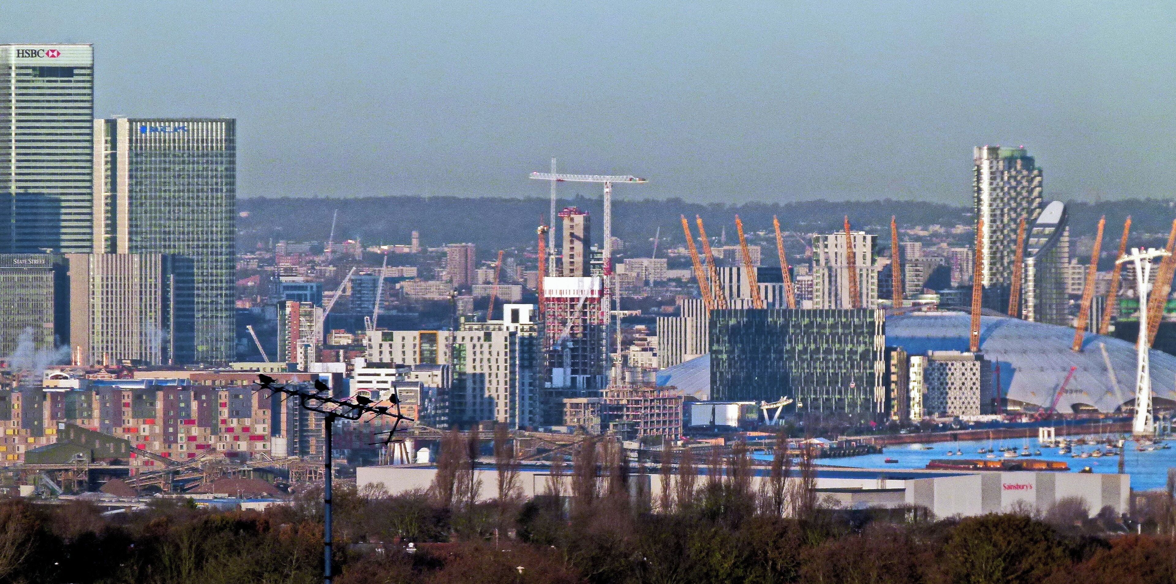 View from Shooters Hill, South East London, of Canary Wharf and Greenwich Peninsula buildings.