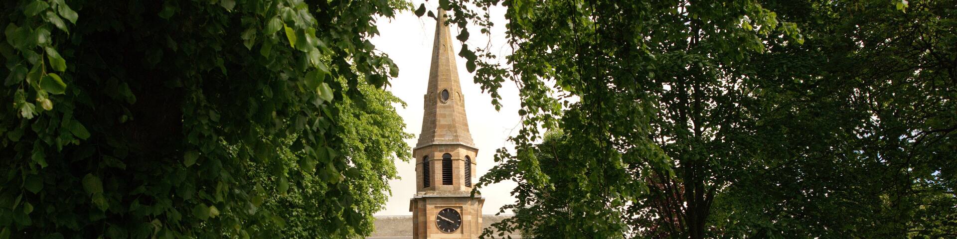 Melrose church and bench on quiet Sunday