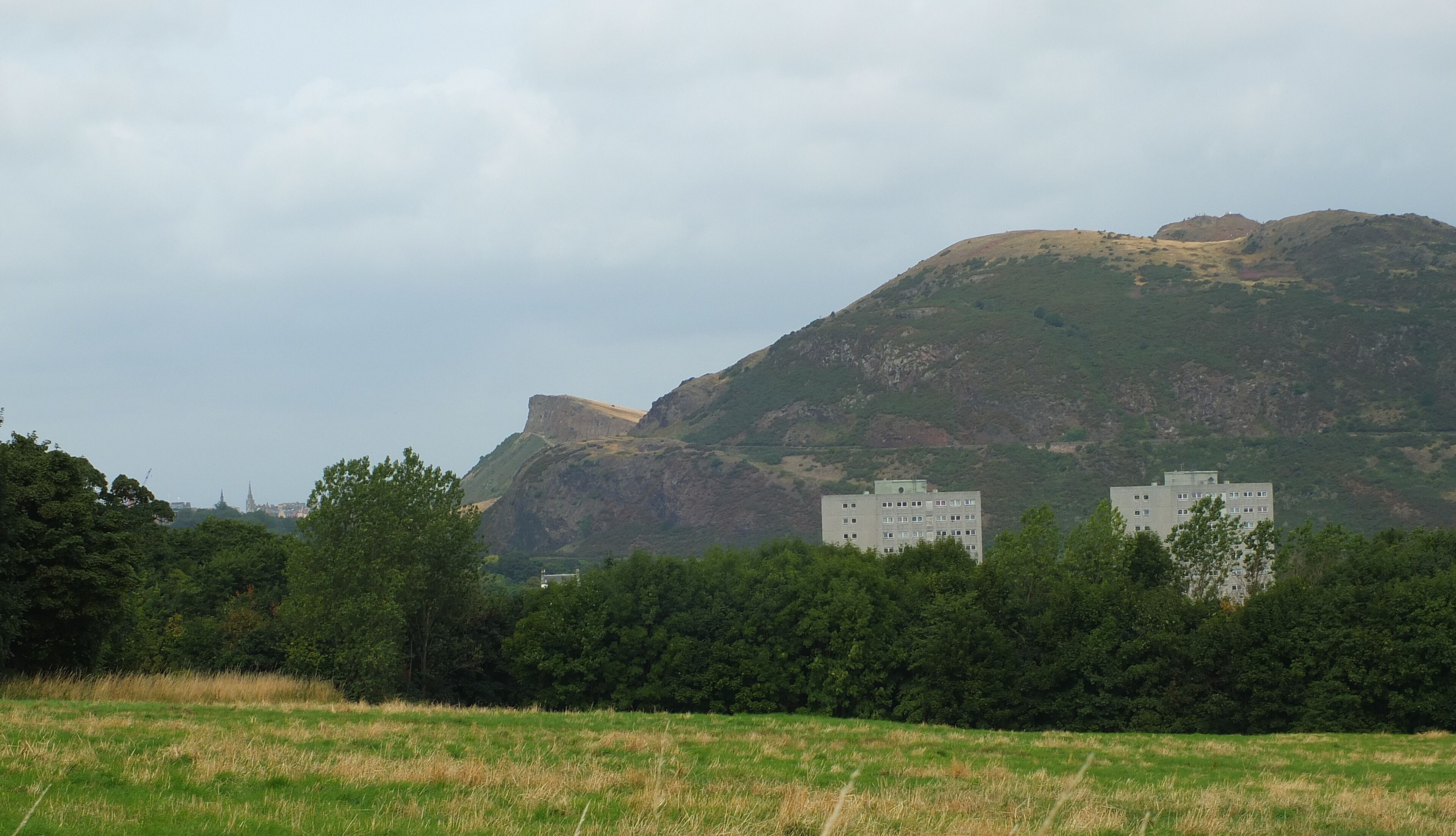 Salisbury Crags and Arthur's Seat, the main peak of the group of hills which form most of Holyrood Park, Edinburgh.