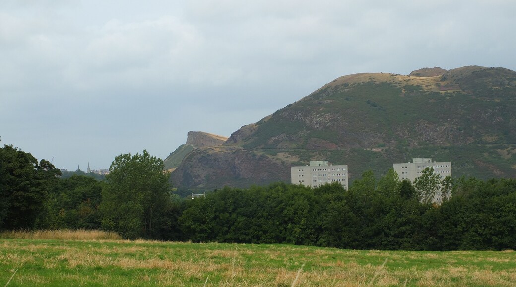 Salisbury Crags and Arthur's Seat, the main peak of the group of hills which form most of Holyrood Park, Edinburgh.