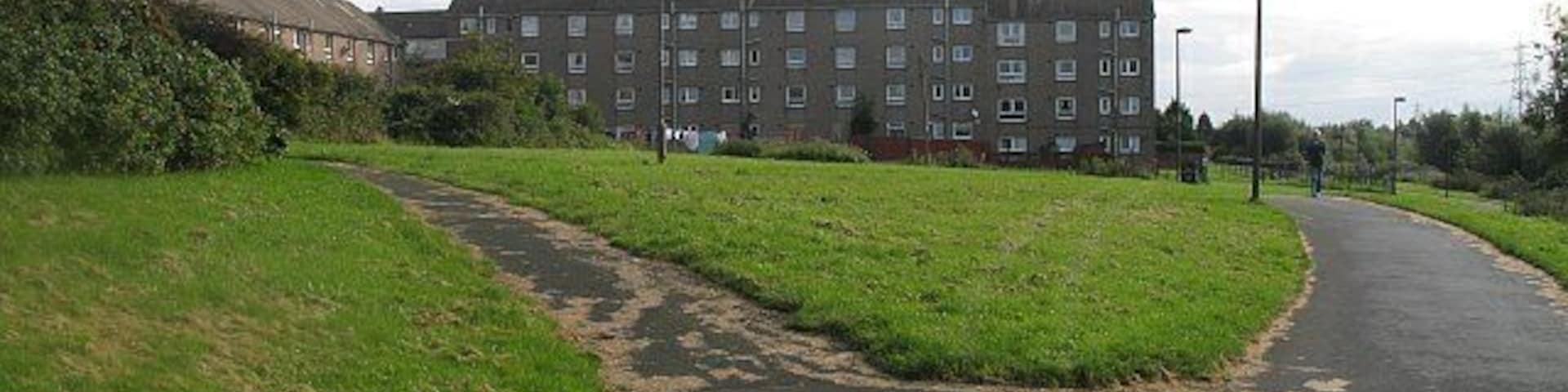 Flats, Magdalene Gardens Blocks of flats seen from a cycle path.