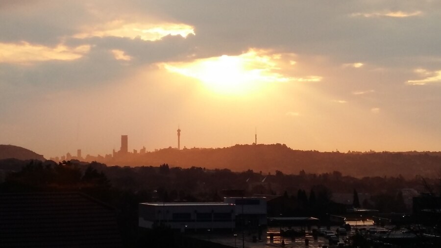 Incredible African sunset lighting up the johannesburg skyline. View from my apartment
#AboveItAll