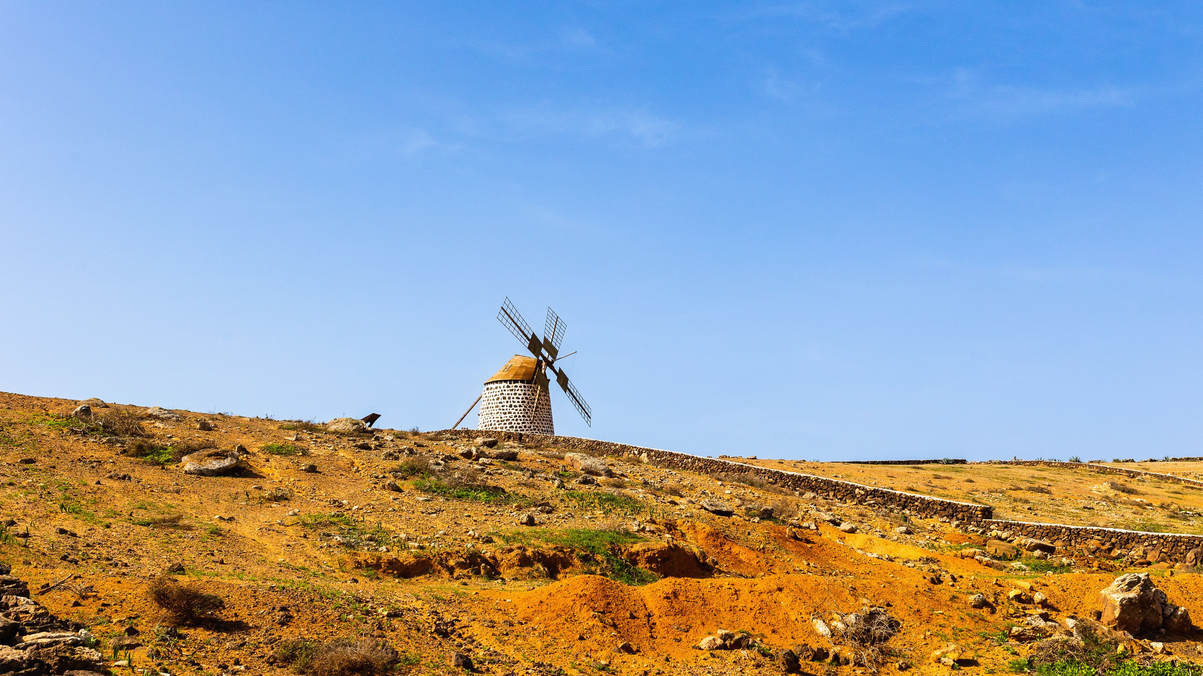 Colorful spanish rural landscape. Old windmill in Villaverde village, Fuerteventura, Canary Islands, Spain