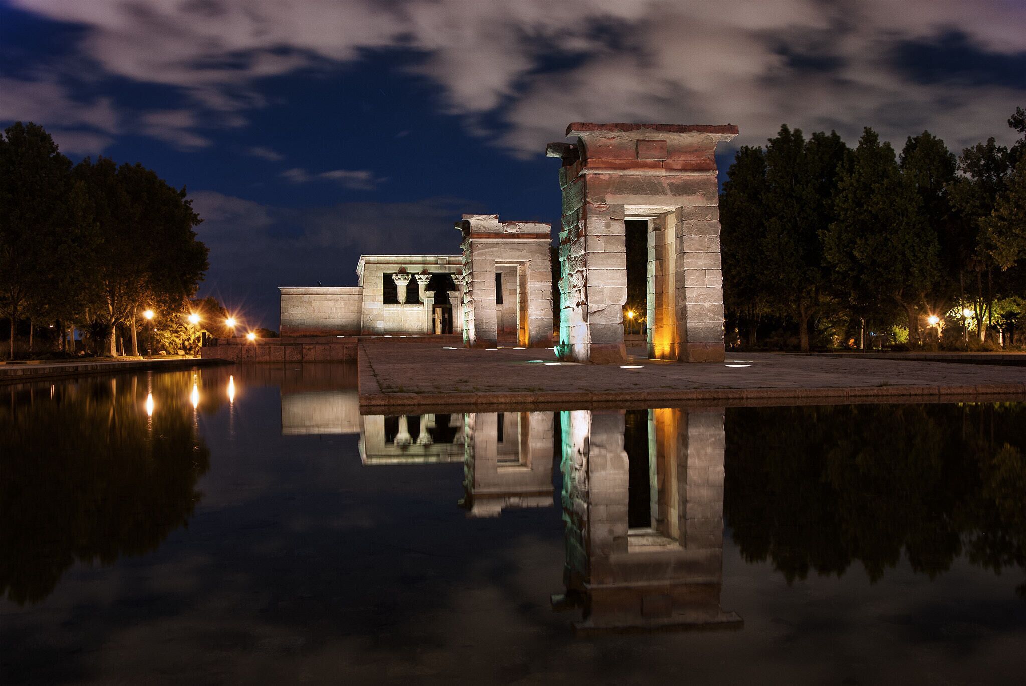 500px provided description: Debod Temple [#city ,#water ,#reflection ,#night ,#urban ,#architecture ,#temple ,#monument ,#spain ,#madrid ,#debod ,#templo ,#500pxTours]
