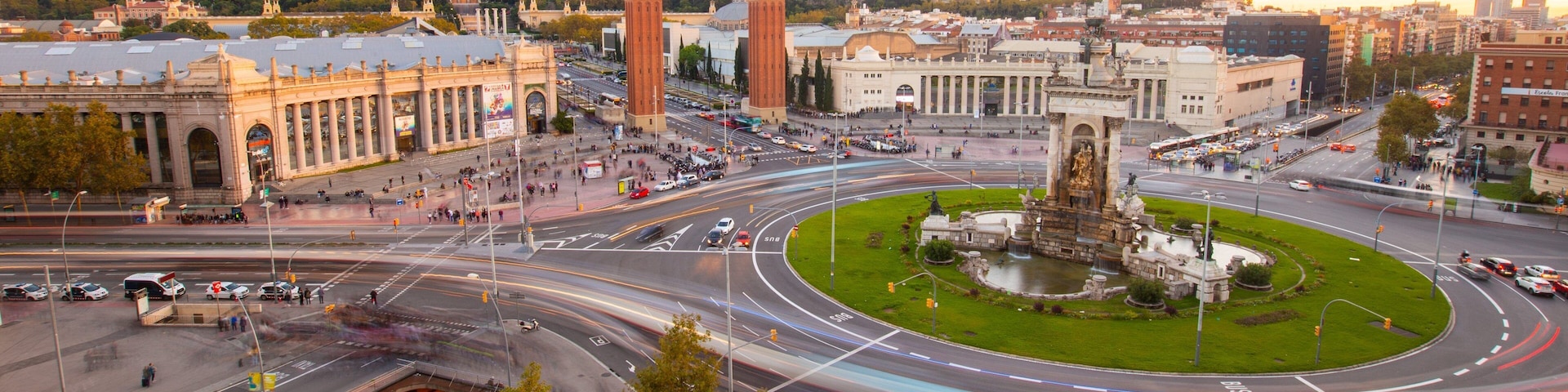 Placa d\'Espanya which includes a sunset, landscape views and a city