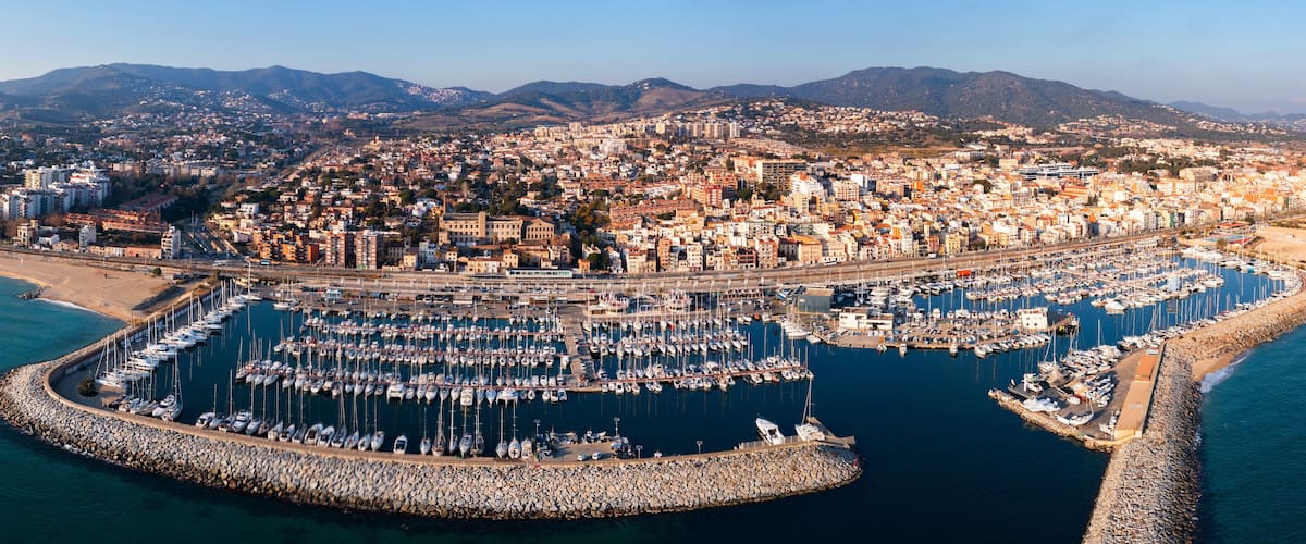 Aerial panoramic view of coastal El Masnou city, Catalonia, Spain