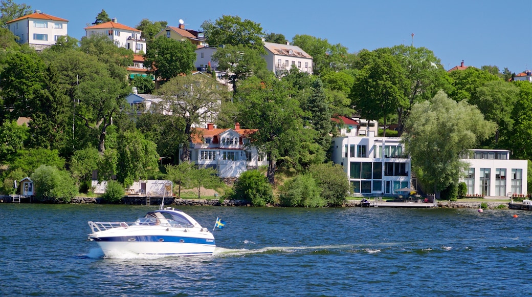Drottningholm showing boating, a lake or waterhole and a small town or village