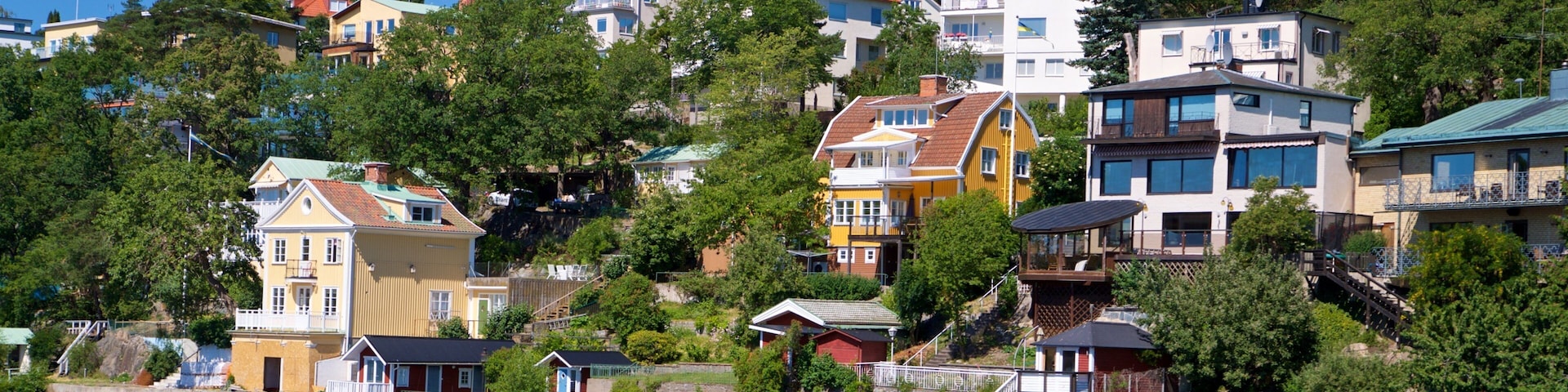 Drottningholm which includes a small town or village and a lake or waterhole