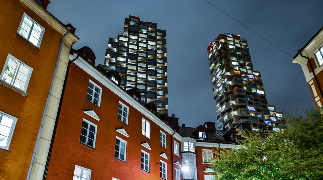 Stockholm, Sweden The old residential Norrbackagatan street in Vasastan at night contrasts with the modern Norra Torn complex.