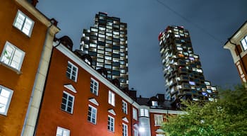 Stockholm, Sweden The old residential Norrbackagatan street in Vasastan at night contrasts with the modern Norra Torn complex.