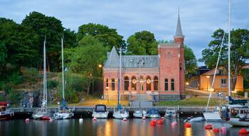 Skeppsholmen featuring a church or cathedral, a bay or harbor and heritage architecture