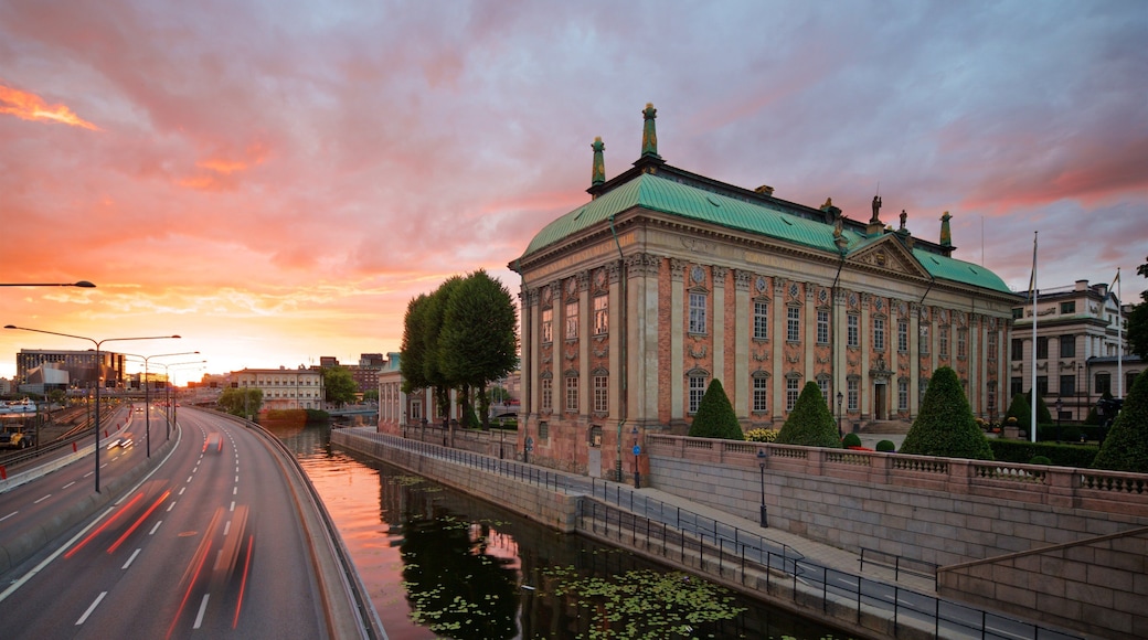 Riddarholmen featuring a city, heritage architecture and a sunset
