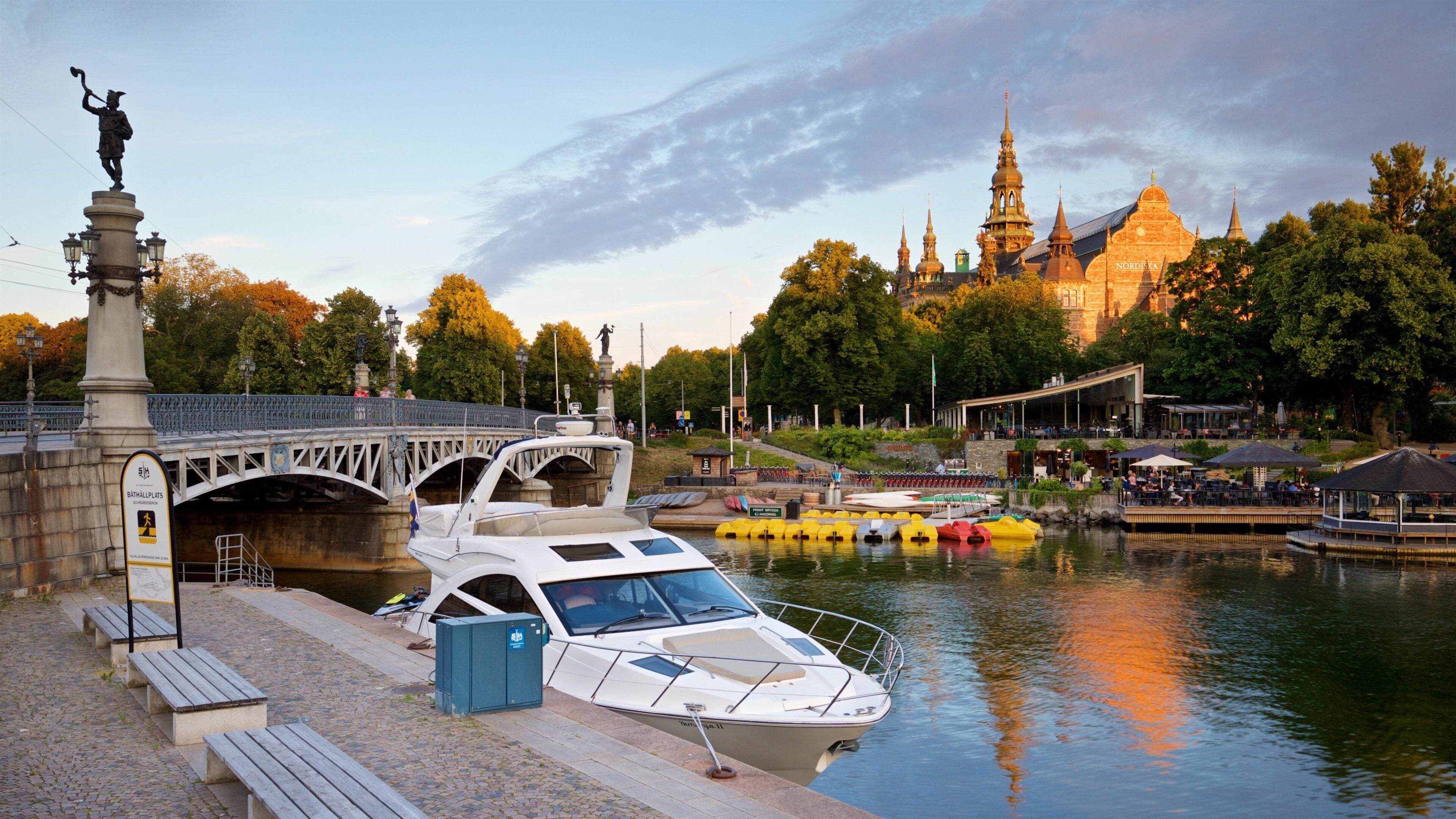 Ostermalm showing a sunset, a bay or harbor and a bridge