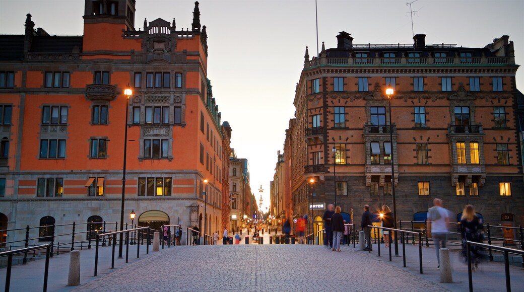 Norrmalm showing a city, heritage architecture and a sunset