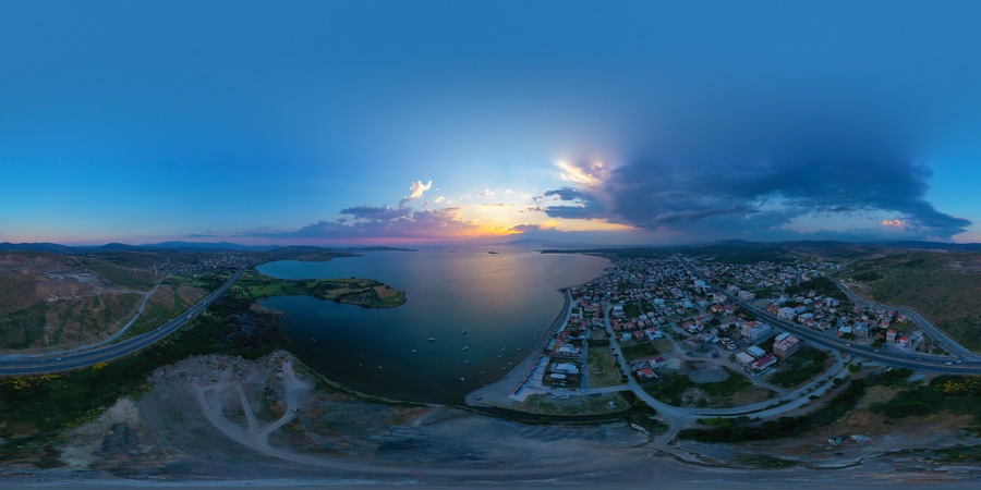 View of the pier and boats at sunset in Izmir, Aliaga, Yenisakran coast.