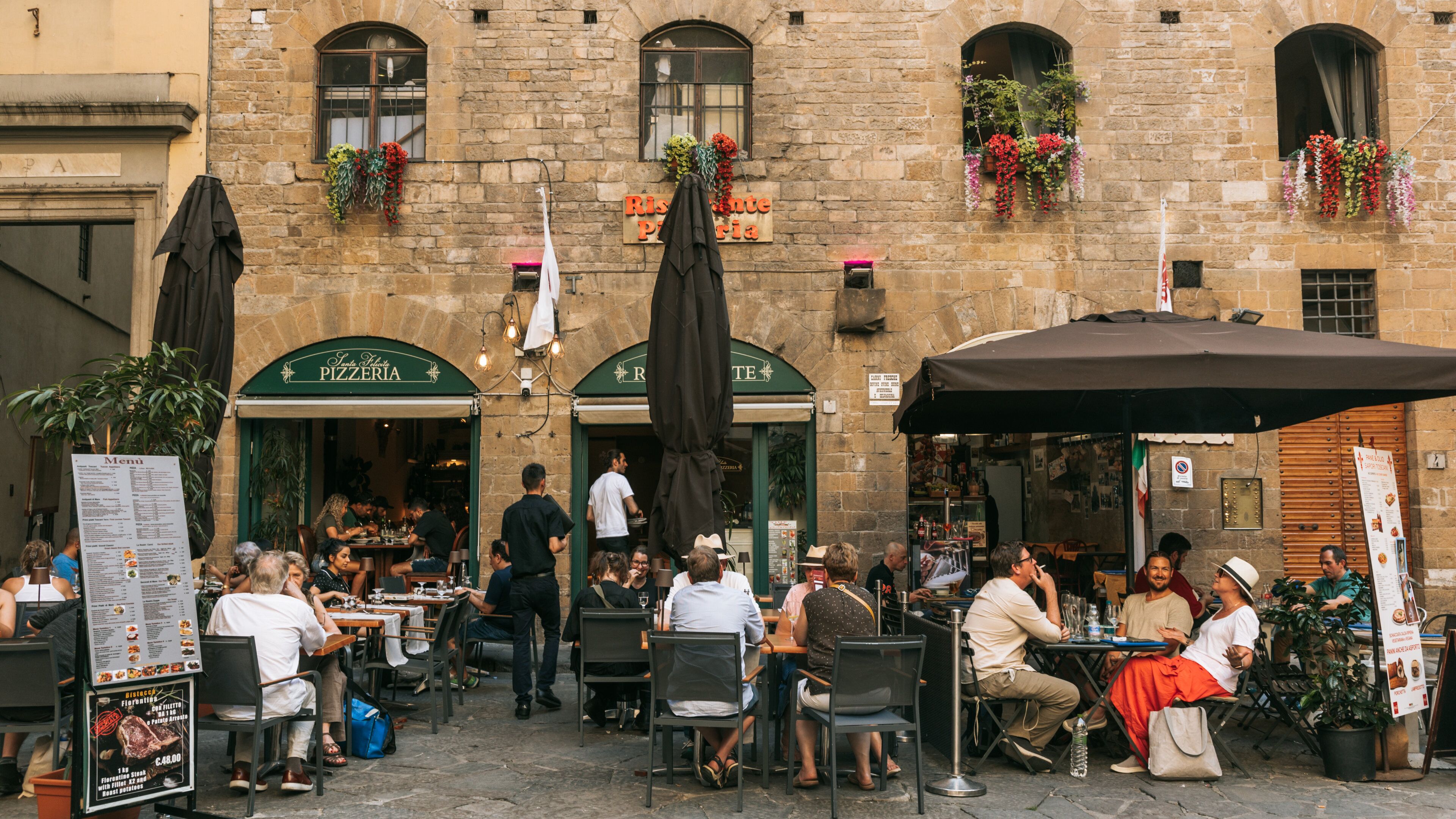 Province of Florence featuring street scenes and outdoor eating as well as a small group of people
