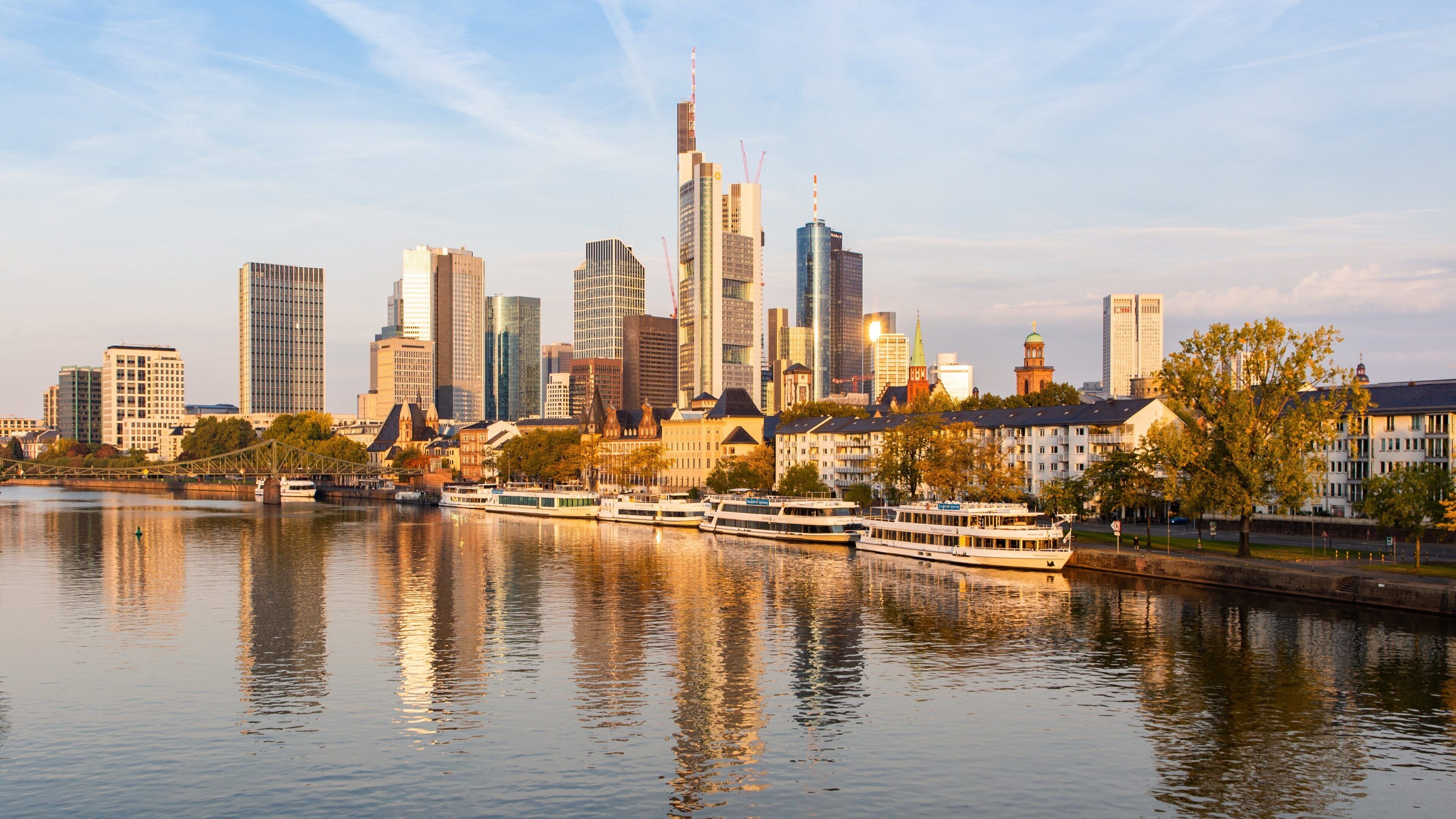 Frankfurt featuring a bay or harbor, a sunset and a city