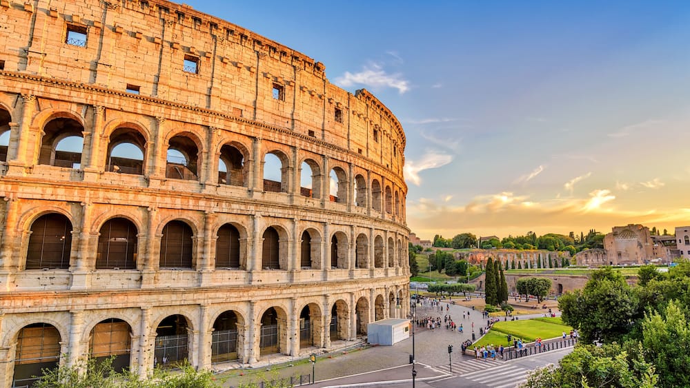 Rome sunset city skyline at Rome Colosseum (Roma Coliseum), Rome, Italy