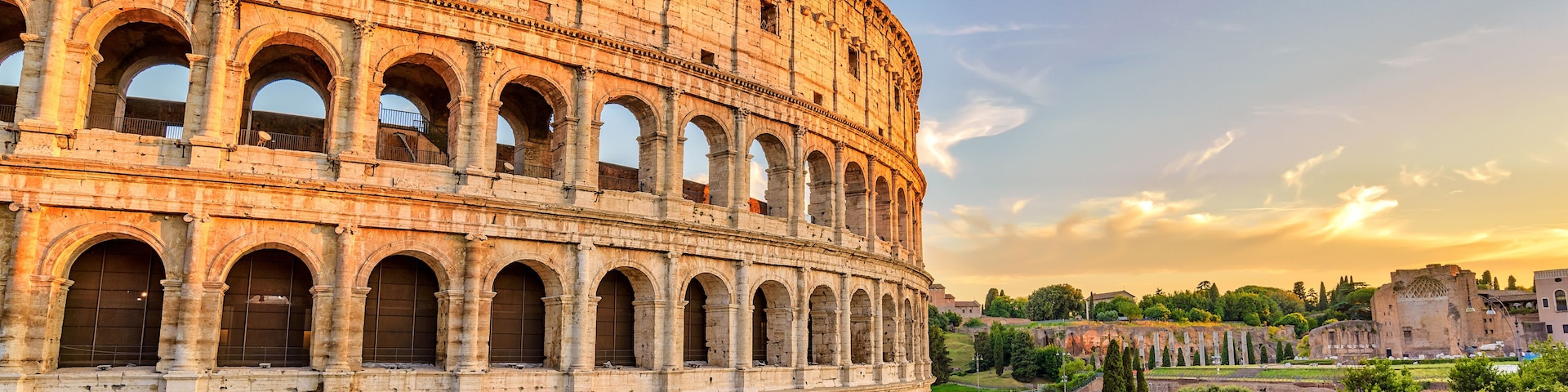 Rome sunset city skyline at Rome Colosseum (Roma Coliseum), Rome, Italy