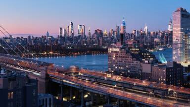 Williamsburg bridge and Midtown Manhattan skyline.