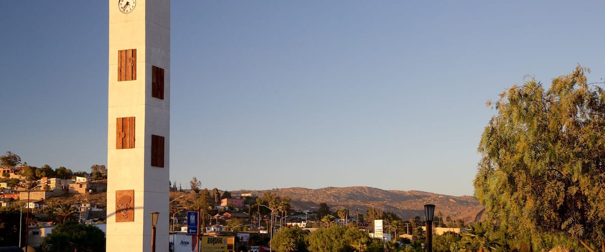 Tecate featuring a square or plaza, a sunset and a monument
