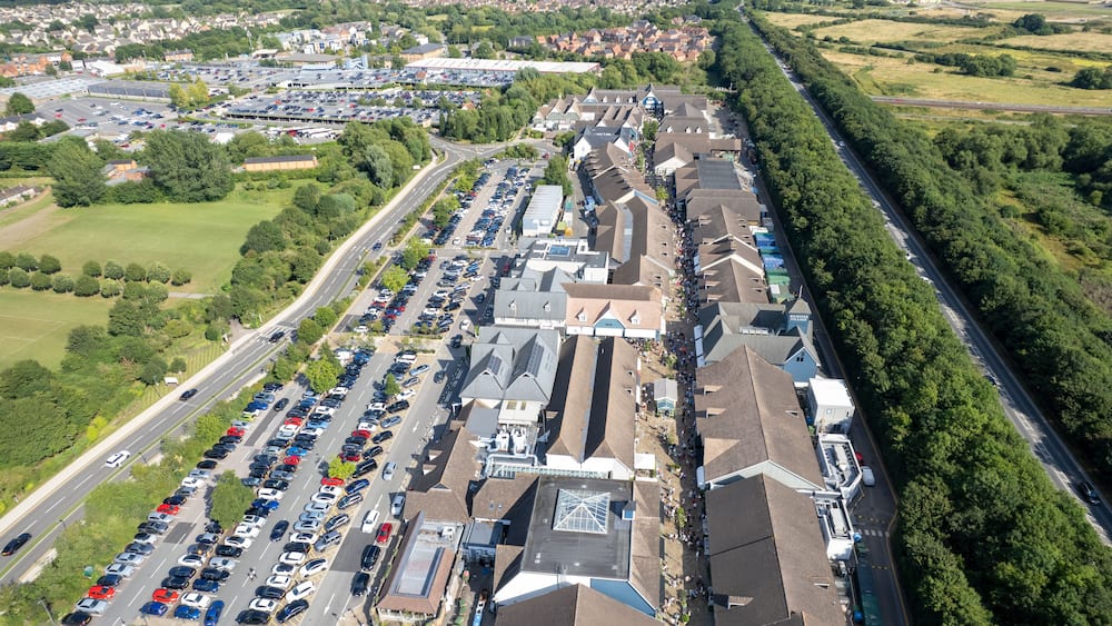 Bicester Village and Bicester town center, amazing aerial view in summer daytime, uk