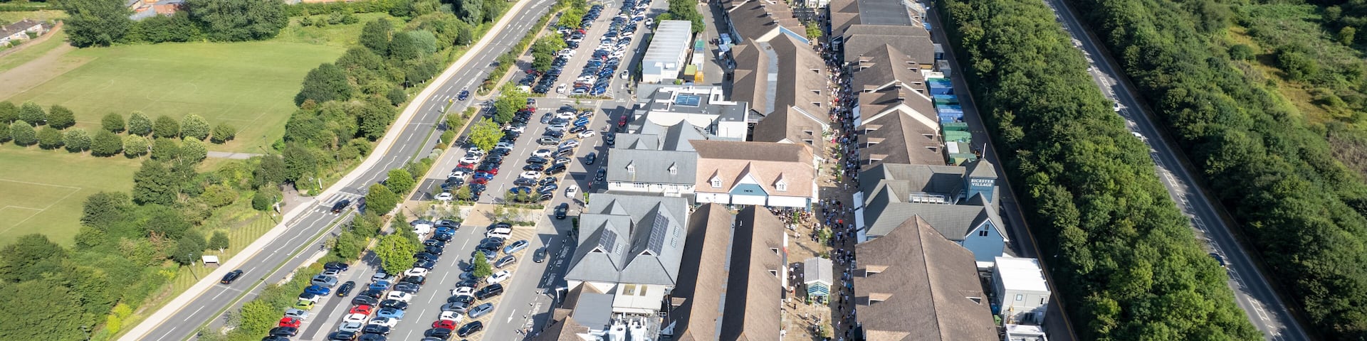 Bicester Village and Bicester town center, amazing aerial view in summer daytime, uk