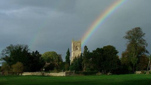 A double rainbow behind the tower of St Mary and St Edburga's parish church, Stratton Audley, Oxfordshire