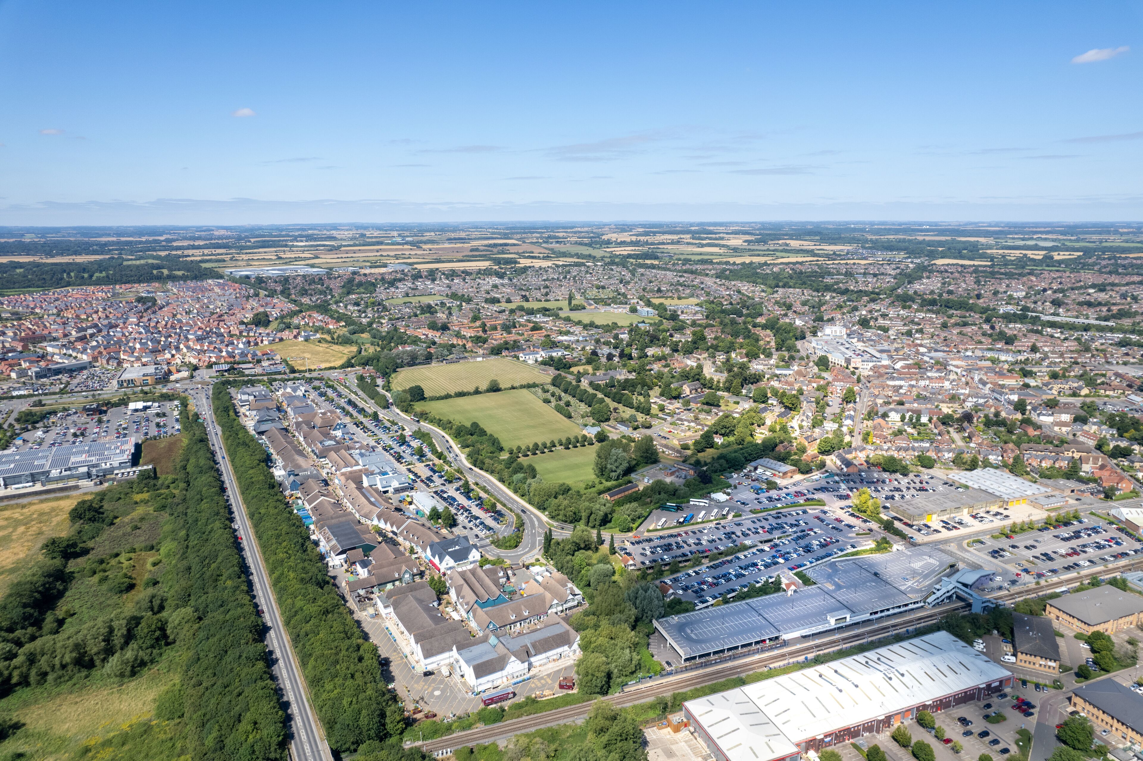 Bicester Village and Bicester town center, amazing aerial view in summer daytime, uk