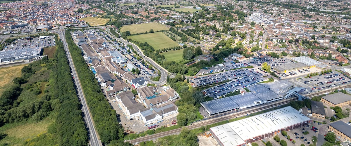 Bicester Village and Bicester town center, amazing aerial view in summer daytime, uk