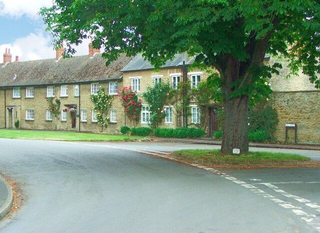 Three roads join in Stratton Audley Stoke Lyne Road meets Mill Road at the junction with Launton Road from the right beneath the chestnut tree