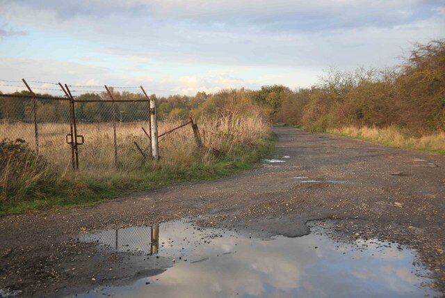 Puddles along a rough track Rough track leading of the Mattersey to Ranskill road