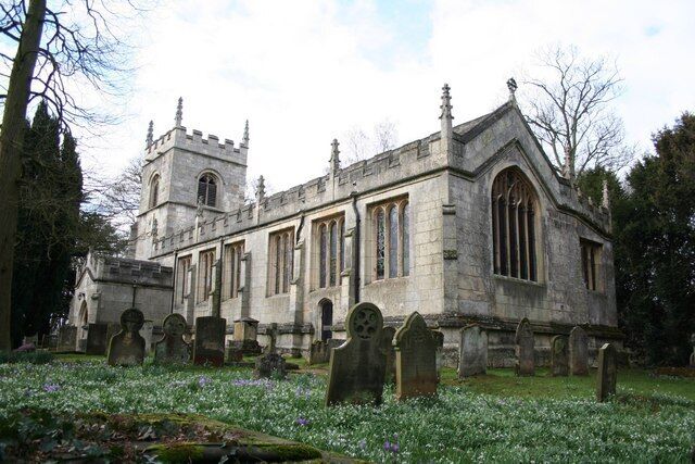All Saints' church Crocus and snowdrops by All Saints' church at Babworth