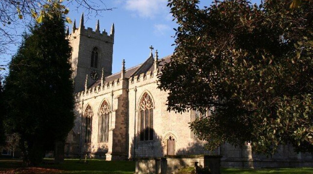 St.Bartholomew's church, Sutton-cum-Lound. Perpendicular tower and nave, Early English arcade, a re-set Norman chancel arch and some of the best Decorated gothic windows in the chancel!