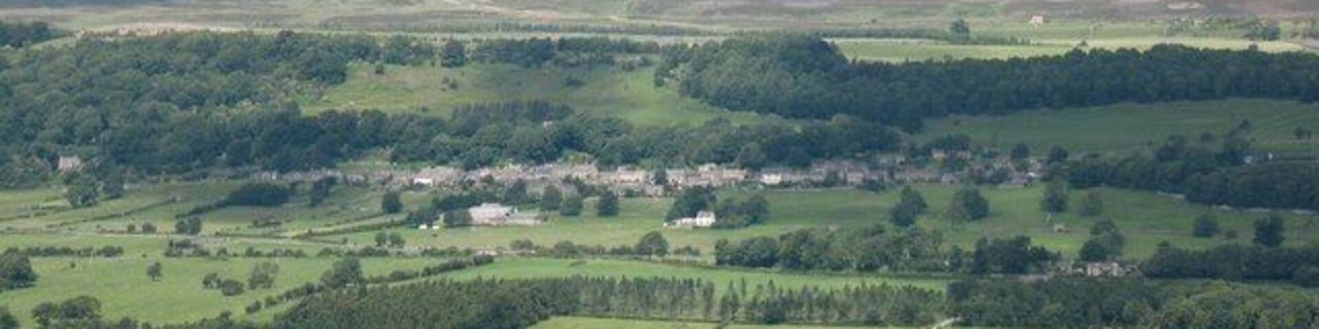 Preston under Scar The view of the village from the opposite side of the dale. Preston Scar is behind the village, with the limestone quarries almost totally hidden from this angle.