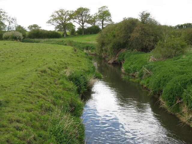Adur tributary flowing SW below weir