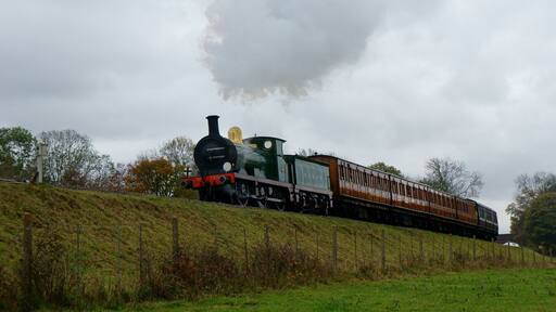 Seen on the embankment, with 'Three Arch Bridge' just visible in the background.