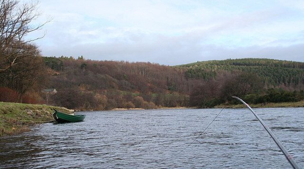 A salmon angler's point of view on Junction Pool at Rothes. It's February and the water is fairly cold; still the call of the spring salmon cannot be resisted! With a 15 foot long fly rod in one hand and camera in the other my intention was to show the sport literally from the angler's point of view. Within seconds of this picture being taken a fish did take the fly and if you look at the other pictures in this series you will see the results.
