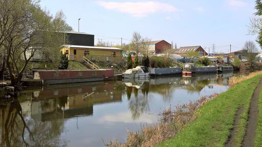 This small wharf on the Leeds and Liverpool Canal in the civil parish of Altham, Lancashire is the site of the former Moorfield Colliery. It opened around 1880 and mining continued until 1949.