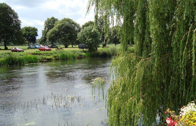 The Avon below the bridge at Bidford The river hardly looks deep enough for rivercraft but we saw several go by . Splendid parking along the southern bank and cricket beyond perfect for a sunday run out .