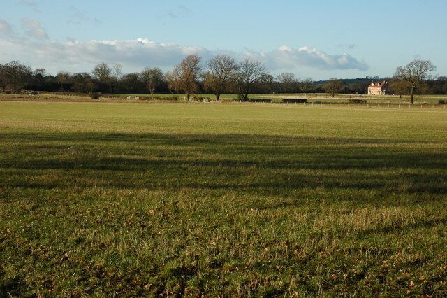 New house near Morton Spirit Farm View across farmland to a recently built house near Morton Spirit Farm, viewed from the south-east from the footpath beside Weethley Wood.