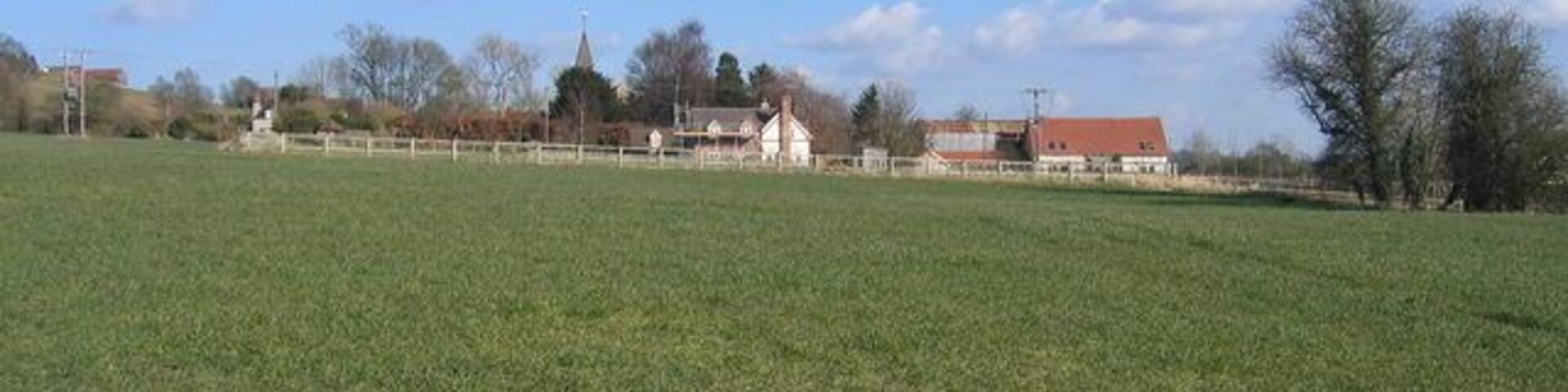 Wixford church house and church. Looking east from the footpath from Wixford. The timber framed houses are near the eastern edge of this square with the church beyond straddling the boundary with the next square to the east.