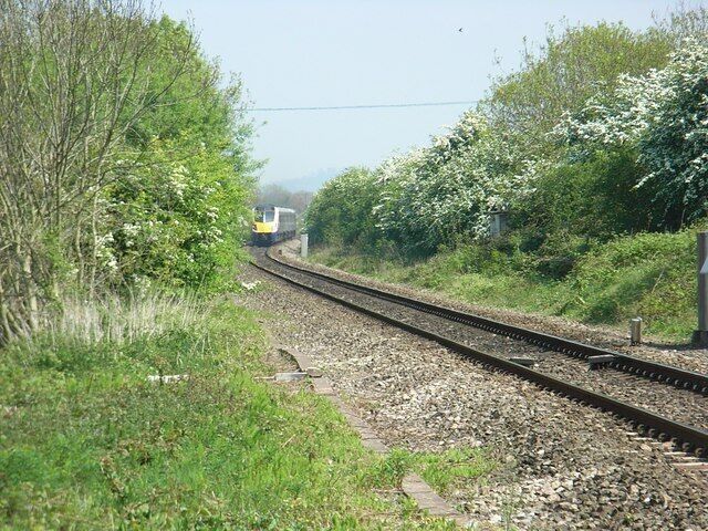 Looking East from Blackminster level crossing A London Paddington bound train speeds on its way. This was the site of the former Littleton and Badsey station.