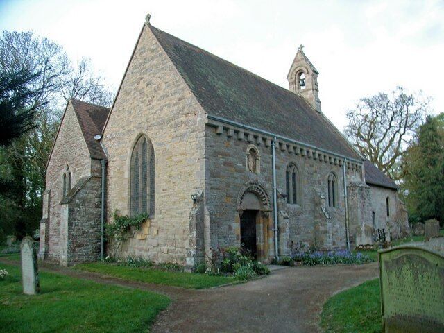 St Peter's parish church, Rous Lench, Worcestershire, seen from the southwest. The church is built of various types of stone, few of which are local.