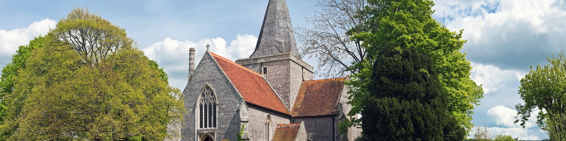 St Andrew's parish church, Alfriston, East Sussex, seen from the southwest. 3 by 5 segment stitched panoramic image taken by myself with a Canon 5D and 70-200mm f/2.8L lens at 70mm.