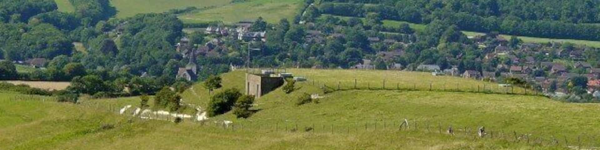 Reservoir on the South Downs Way. Looking west. The village behind is Alfriston.