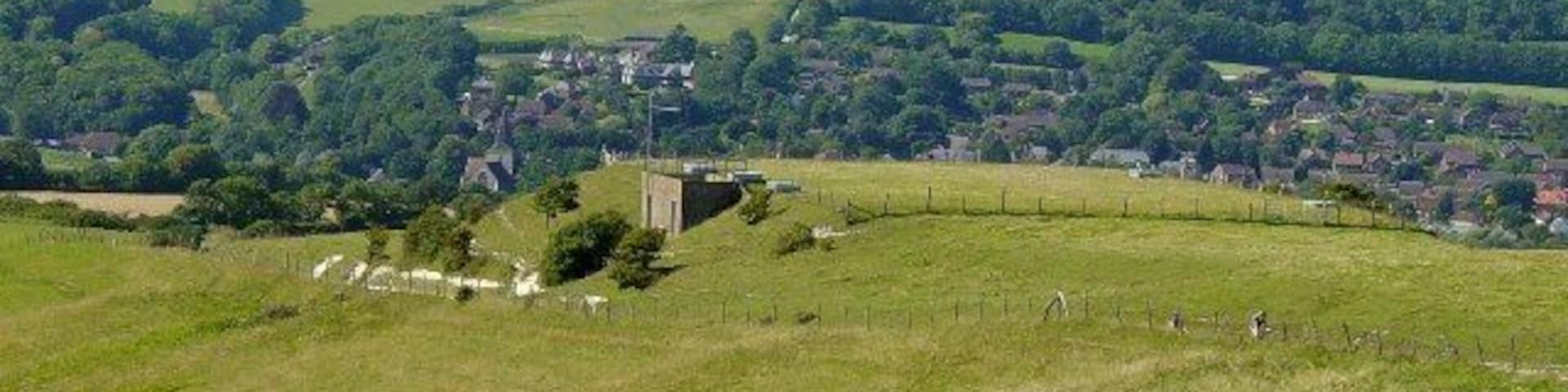 Reservoir on the South Downs Way. Looking west. The village behind is Alfriston.