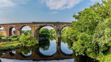 A panorama view from the road bridge towards the railway viaduct at Yarm, Yorkshire, UK in summertime