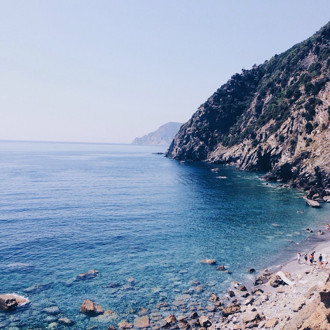 This is Guvano Beach. 
A man said to me that this was the hippies and nudists beach, back in the 60s. 
There are still nudists and people believing they are actually living in the 60s with their white Volkswagen van